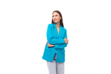 young successful brunette leader woman in a blue jacket on a white background with copy space