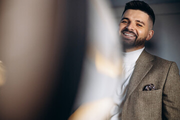 Handsome business man in studio showing emotions