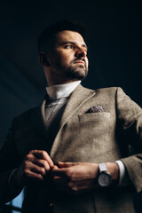 Handsome business man in studio showing emotions