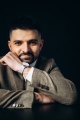 Handsome business man in studio showing emotions