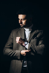 Handsome business man in studio showing emotions