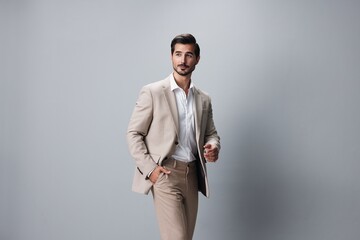 copyspace man suit handsome happy businessman smiling business model portrait beige