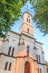 Facade of the evangelical-augsburg church of St. Apostle James the Elder in Ustroń in the Silesian Beskids (Poland). Above the entrance there is an inscription 