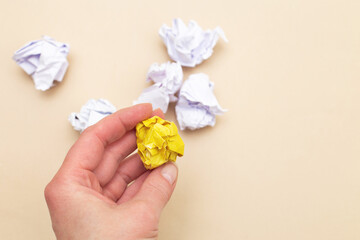 crumpled yellow and white paper as a concept creative idea and innovation
