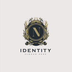 Initial N letter luxury beauty flourishes ornament golden monogram logo art