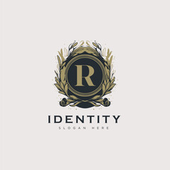 Initial R letter luxury beauty flourishes ornament golden monogram logo art