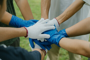 Hand stacking.Volunteer join hand together concept.Teamwork,empathy,partnership.Ecology concept and...