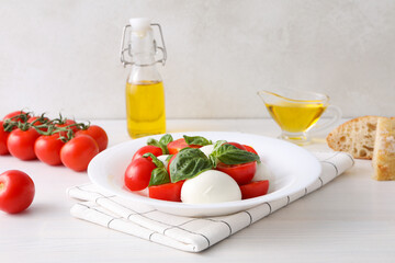 Concept of tasty Italian cuisine food - Caprese salad
