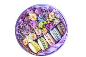 Round cardboard box with buds of small roses and colorful macaroons. View from above. Isolate. PNG
