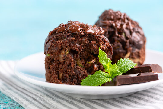 Chocolate muffins with zucchini close-up.