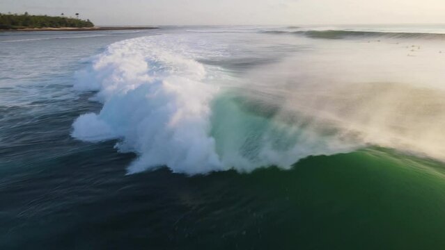 Huge ocean waves crashing on G-Land, Grajagan Bay, Java, Indonesia, slow motion, close up