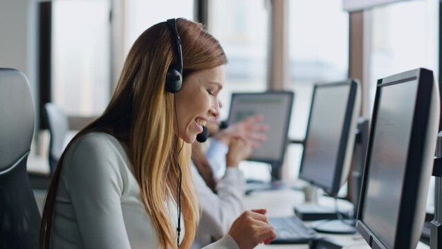 Customer service agent helping with solution on call. Inspired woman look idea