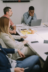 Fototapeta premium Diverse multi-generational group of people working on a new project