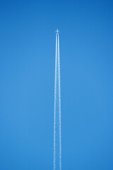 simple plane in sky on blue background