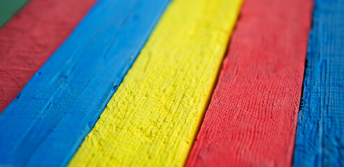 old planks in the colors of the rainbow colorful wood background made with generative Ai
