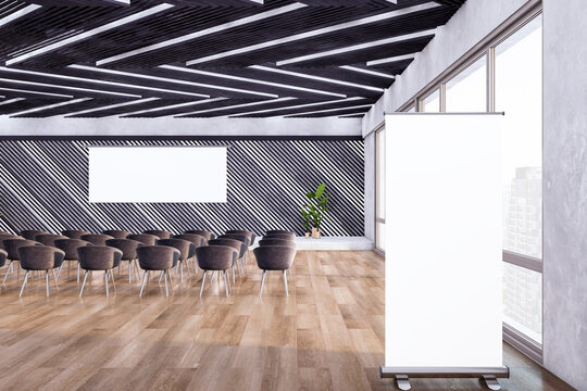 Modern lecture hall interior with empty white mock up banner screen and roll up poster. Modern company or school. 3D Rendering.