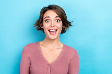 Photo of funny excited stunning lady open mouth listen good news wear pink shirt buttons isolated blue pastel color background