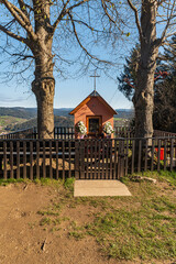Fototapeta na wymiar Small chapel between trees on Bukovina hill in Javorniky mountains above Turzovka town in Slovakia