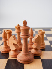 Set of wooden chessboard with chess pieces isolated on white background   