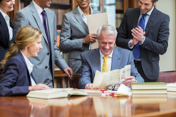 Lawyers examining documents in chambers