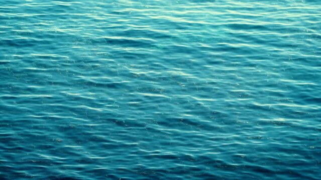 Blue clear sea water surface. Nature background