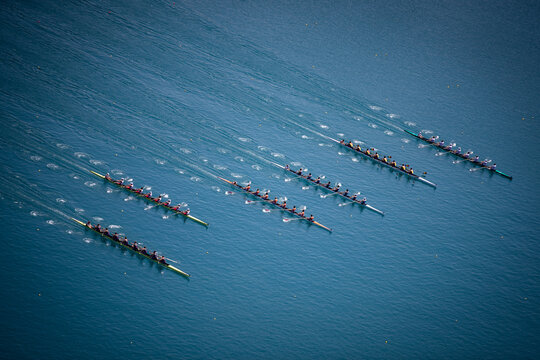 Men's Eight rowing boats rowing on Lake Bled