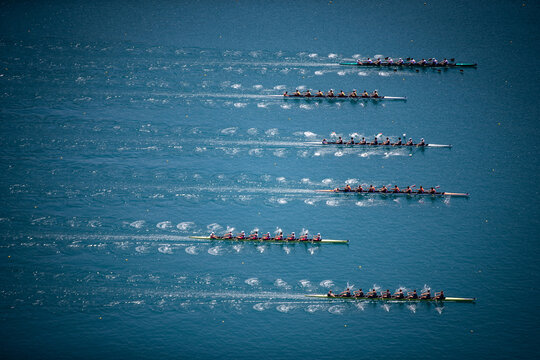 Men's Eight rowing boats rowing on Lake Bled