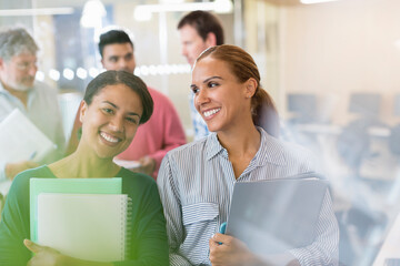 Portrait confident women in adult education classroom