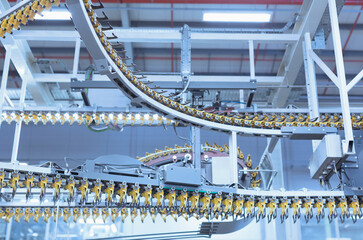 Printing press conveyor belts overhead