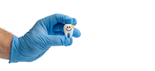 Hand in blue glove holding a tooth model with a smiley face