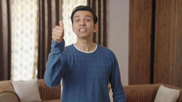 Indian adult youtuber recording a video for social media