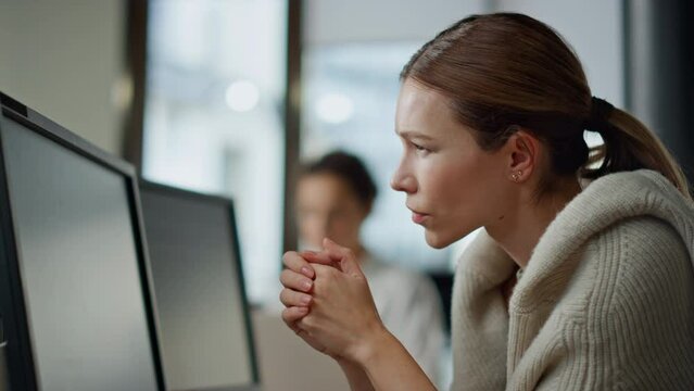 Worried it manager analyze software code closeup. Exhausted woman rubbing head