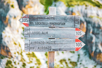 Mountain way signage to Rifugio Tre Cime, Lange Alm and Rifugio Auronzo. Tre Cime, Dolomites, South Tirol, Italy, Europe.