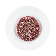 Raw hamburger steak with sesame seeds. Isolated on a white background.
