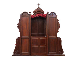 Detail of an old wooden confessional in a Spanish church, in Las Palmas de Gran Canaria on a white background - obrazy, fototapety, plakaty