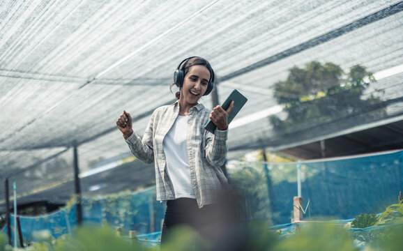 Farming worker enhance healthy work-life balance by listening to music and moving body to the beat and rhythm. Designing flexible working schedule, taking breaks to rest, recharge energy and vitality