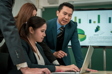 Modern Asian businessman with high confidence Committed to working together as a harmonious team Having a professional planning meeting at the company