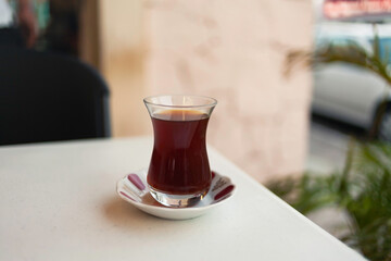 Tea served in a tulip shaped glass