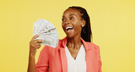 Cash, fan and winner with a black woman in studio on a yellow background holding money, finance or...