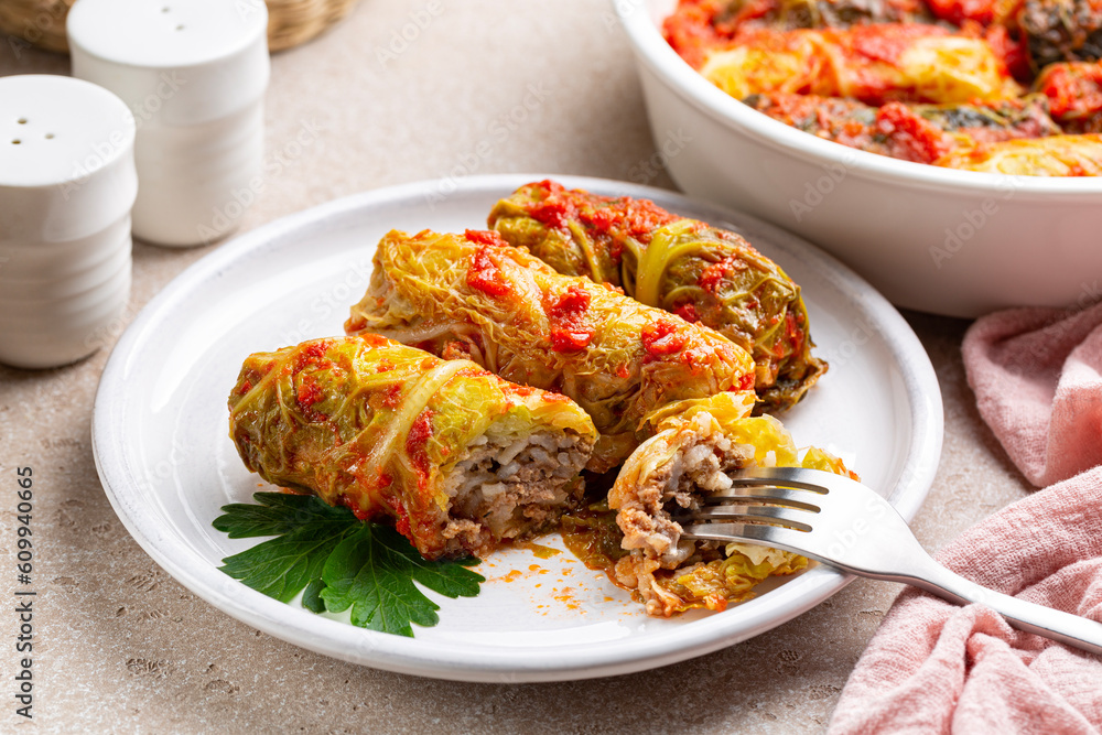 Wall mural Stuffed savoy cabbage with beef meat and rice in a tomato sauce.