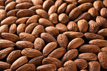 Lots of almonds close up. Nuts. Healthy food