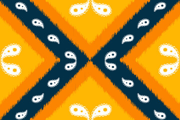 Ikat geometric paisley motif ethnic seamless pattern. Native African, Indian, Asian, Thai, Indonesian style. Design for textile, batik, wallpaper, clothing, fabric, home decor, carpet, texture.