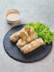 Fresh summer rolls with shrimp and vetgetables,Vietnamese food for healthy food concept with salad...