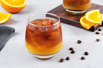 Bumble Coffee, Coffee with Orange Juice with Ice, Refreshing Drink on Grey Background
