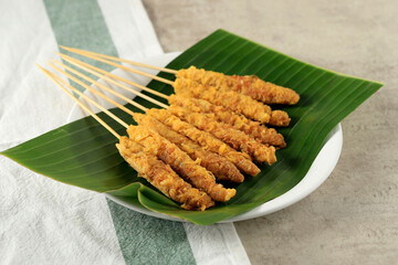 Telor Gulung, Street Food from Indonesia, Egg Rolled on Skewers