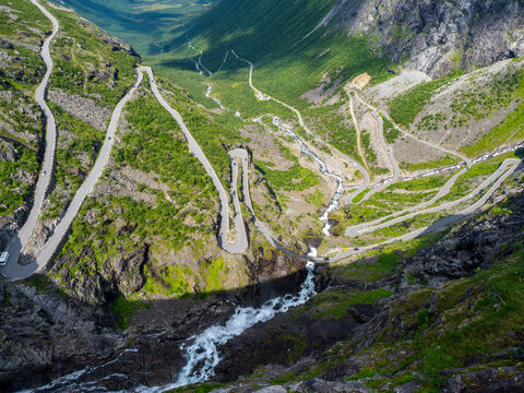 Trollstigen road in summer in Norway. View on mountain and waterfall.