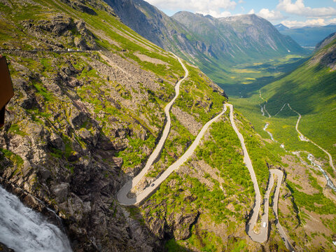 Trollstigen road in summer in Norway. View on mountain and waterfall.