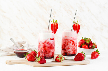 Korean Strawberry Milk, Strawberry Milkshake with Pureed Fresh Berries, Refreshing Drink on Bright Background