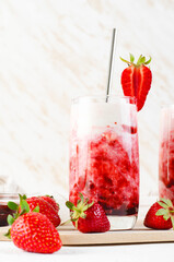 Korean Strawberry Milk, Strawberry Milkshake with Pureed Fresh Berries, Refreshing Drink on Bright Background