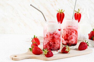 Korean Strawberry Milk, Strawberry Milkshake with Pureed Fresh Berries, Refreshing Drink on Bright Background